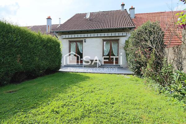 Maison bi-famille de 233 m² avec jardin, verger et garage