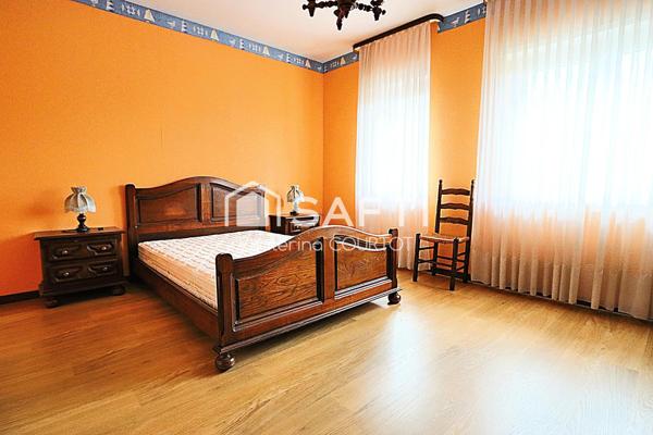 Maison bi-famille de 233 m² avec jardin, verger et garage