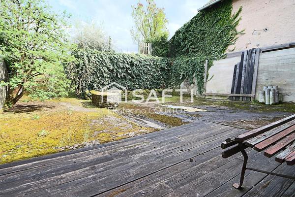 Maison bi-famille de 233 m² avec jardin, verger et garage