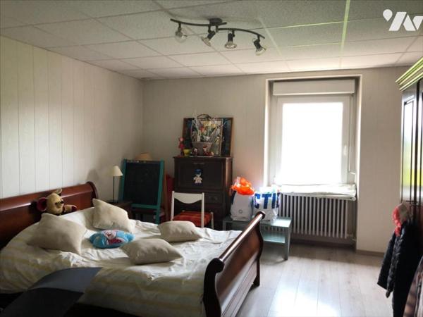 Immeuble de rapport avec 3 appartements, garages, caves