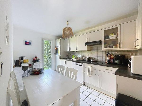 Maison 4 chambres avec garage et jardin