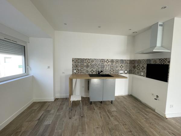 MAISON DE VILLE RENOVEE AVEC JARDIN ET GARAGE