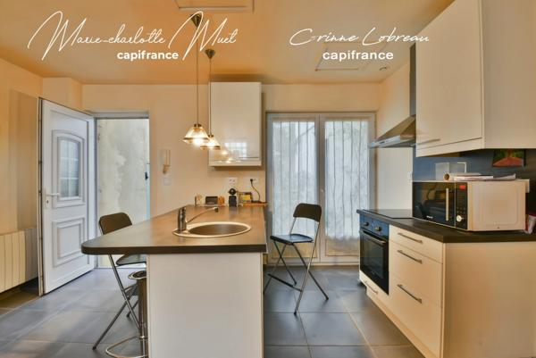 Maison de ville avec deux habitations indépendantes et cour privative