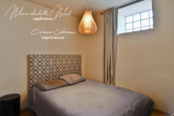 Maison de ville avec deux habitations indépendantes et cour privative