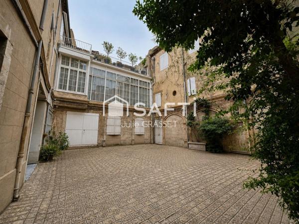 Rare en hypercentre de Béziers : appartement de caractère avec parking privatif dans cour et cave