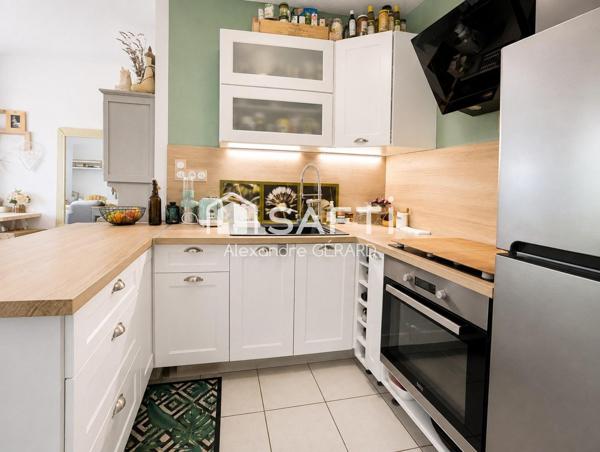 BEL APPARTEMENT T2 AVEC BALCON SUR ESPACE VERT