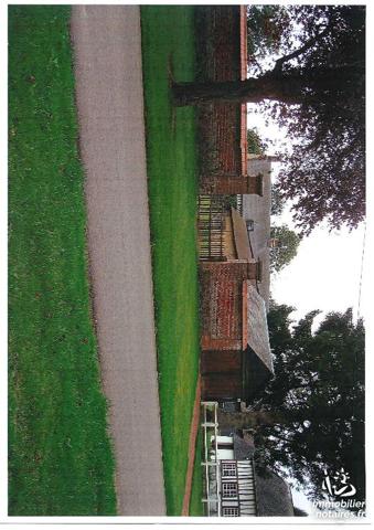 Terrain à bâtir de 1000m² au centre du village de DIGEON.