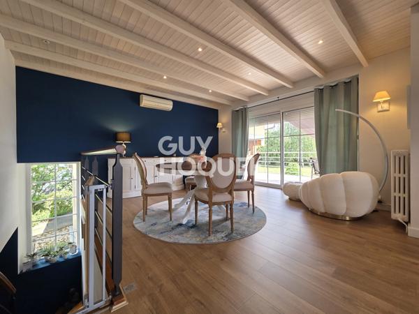 Maison à vendre de 6 pièces de 125 m² habitables (200 m2 avec garages et cave) sur un terrain de 1185 m2