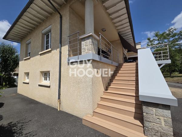 Maison à vendre de 6 pièces de 125 m² habitables (200 m2 avec garages et cave) sur un terrain de 1185 m2
