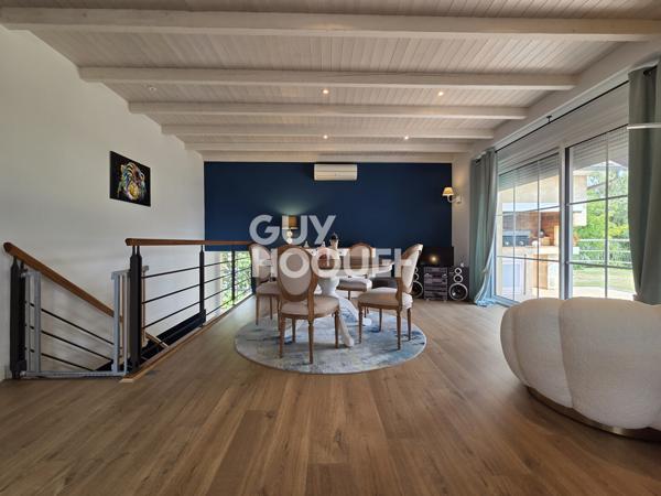 Maison à vendre de 6 pièces de 125 m² habitables (200 m2 avec garages et cave) sur un terrain de 1185 m2