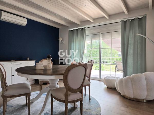 Maison à vendre de 6 pièces de 125 m² habitables (200 m2 avec garages et cave) sur un terrain de 1185 m2