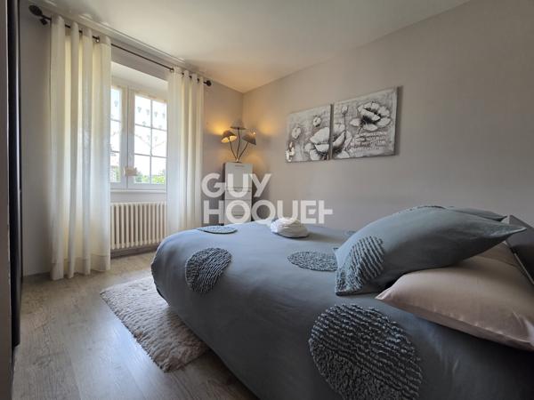 Maison à vendre de 6 pièces de 125 m² habitables (200 m2 avec garages et cave) sur un terrain de 1185 m2