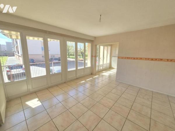 Appartement T4 77 m² -RDC sur élevé- Cave- Garage 