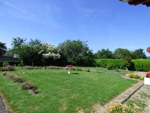 Maison plain pied de 100 m², 2 chambres, garage, terrain de 1450 m²