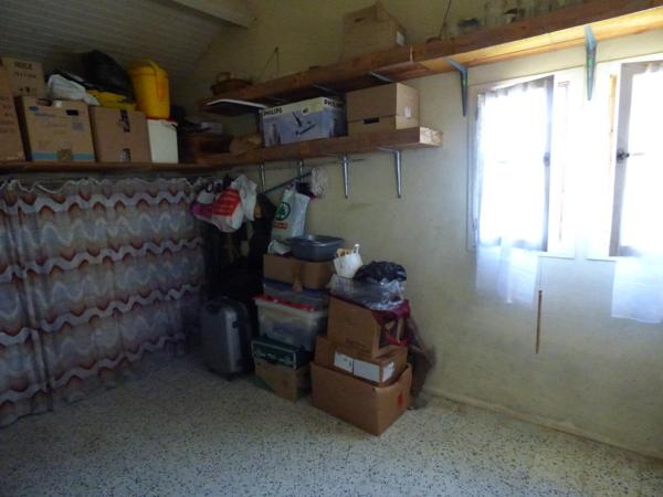 Maison plain pied de 100 m², 2 chambres, garage, terrain de 1450 m²