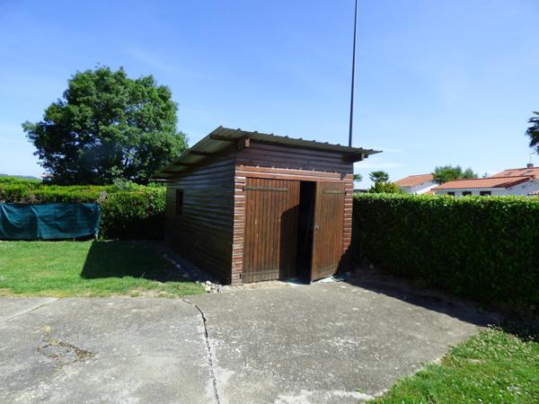 Maison plain pied de 100 m², 2 chambres, garage, terrain de 1450 m²