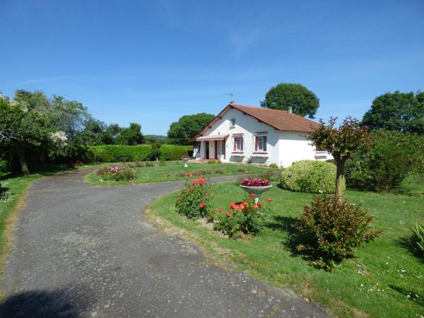 Maison plain pied de 100 m², 2 chambres, garage, terrain de 1450 m²