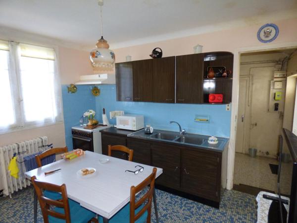 Maison plain pied de 100 m², 2 chambres, garage, terrain de 1450 m²