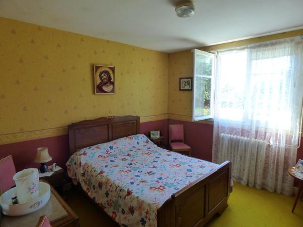 Maison plain pied de 100 m², 2 chambres, garage, terrain de 1450 m²