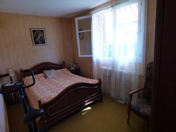 Maison plain pied de 100 m², 2 chambres, garage, terrain de 1450 m²