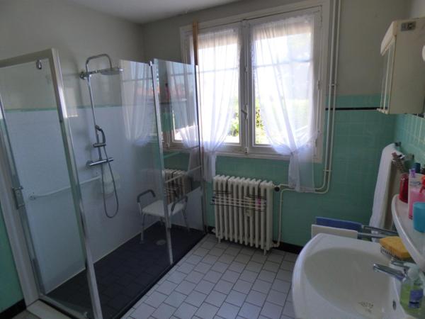 Maison plain pied de 100 m², 2 chambres, garage, terrain de 1450 m²