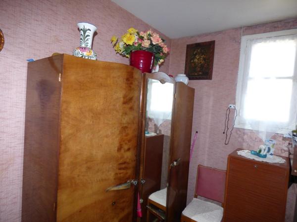 Maison plain pied de 100 m², 2 chambres, garage, terrain de 1450 m²