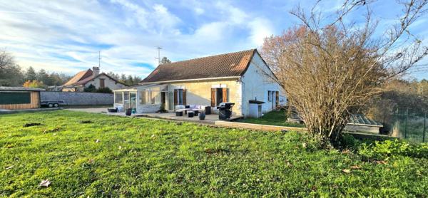 Maison en pierre avec parc