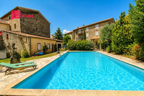 ALES en périphérie à Saint-Hilaire-de-Brethmas   Superbe Appartement P4 de caractère dans un mas du XVIII siècle, avec patio privatif, piscine et parking
