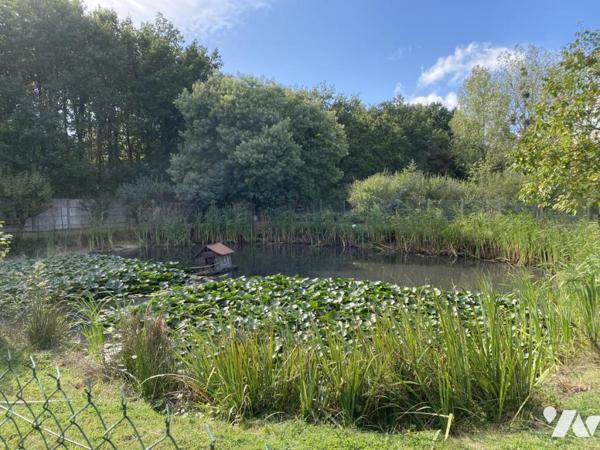 SAINT JULIEN DES LANDES Maison avec Environnement calme