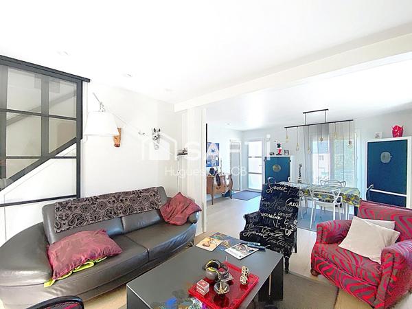 Proche toutes commodités maison avec 4 chambres, véranda et sous-sol