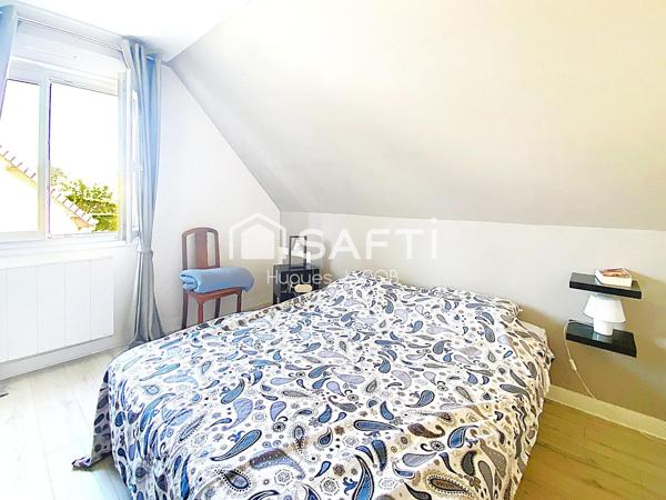 Proche toutes commodités maison avec 4 chambres, véranda et sous-sol