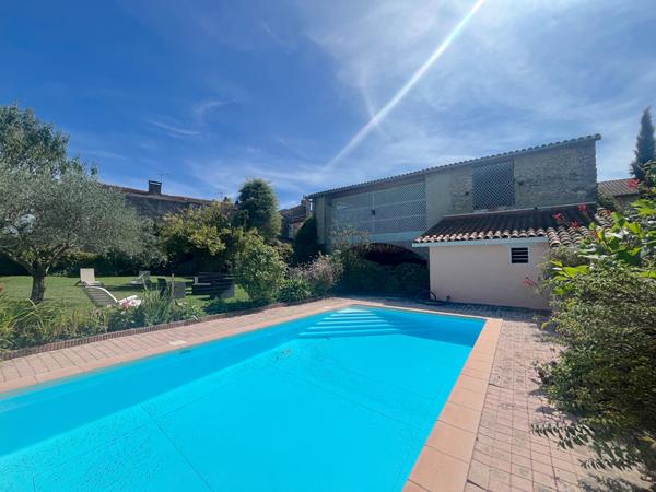 À VENDRE VERNIOLLE : MAISON DE CARACTÈRE AU CHARME UNIQUE.