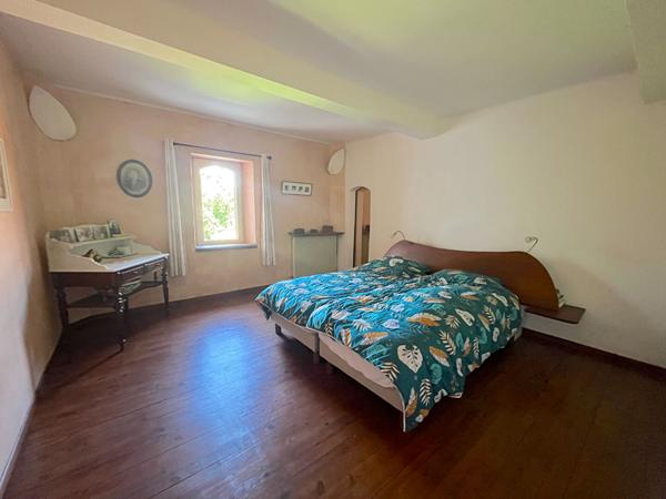 À VENDRE VERNIOLLE : MAISON DE CARACTÈRE AU CHARME UNIQUE.