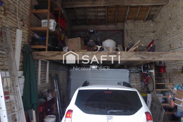 Maison de bourg avec grand jardin, garage, aux portes de Niort !