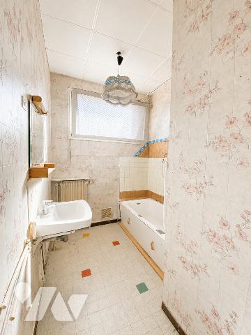 Appartement à rénover, beau potentiel