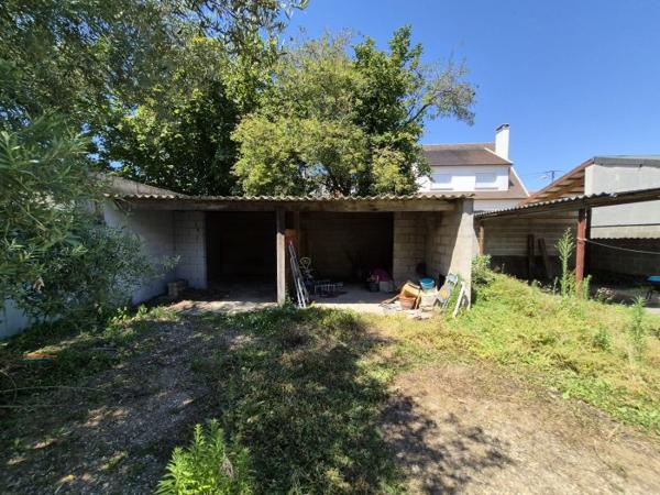 MAISON DIVISEE EN 2 APPARTEMENTS DONT UN LOUE