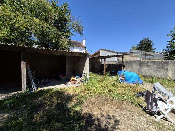 MAISON DIVISEE EN 2 APPARTEMENTS DONT UN LOUE