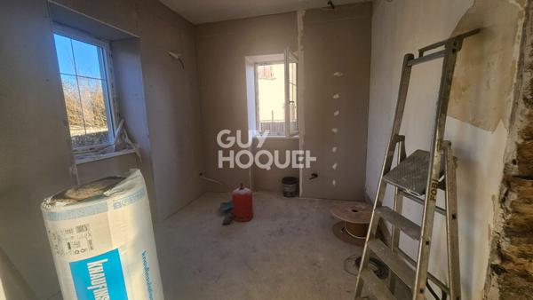 Local commercial 88m² refait à neuf + vitrines + parking