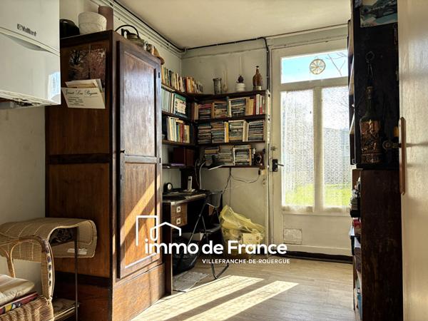 Maison avec garage et terrain proche du centre-ville et toutes commodités