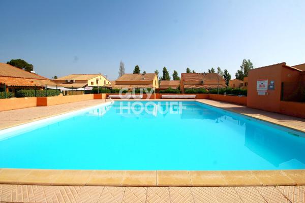 Maison T2 en copropriété + véranda + parking privatif à acquérir en su