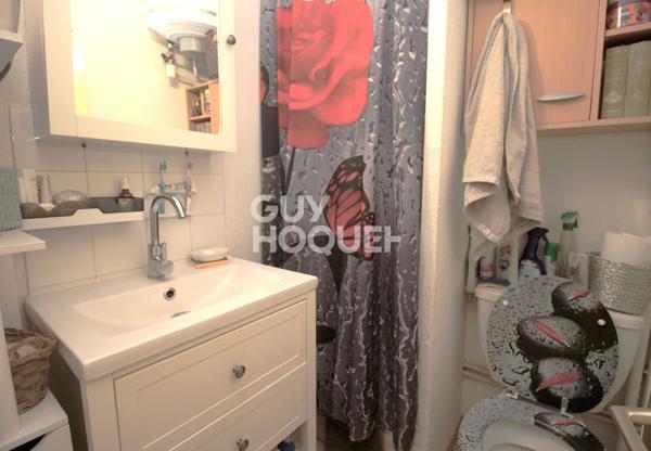 Maison T2 en copropriété + véranda + parking privatif à acquérir en su