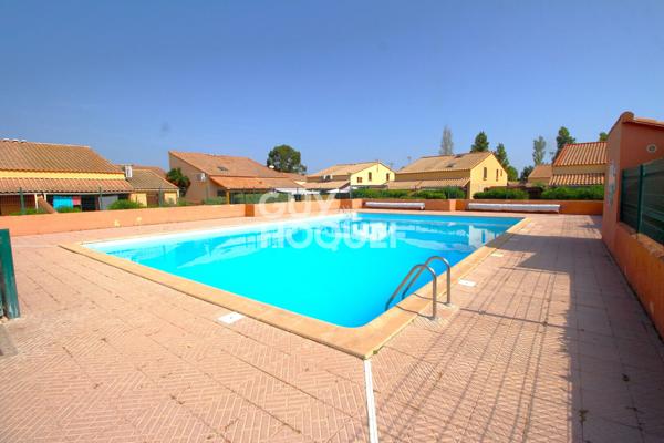 Maison T2 en copropriété + véranda + parking privatif à acquérir en su