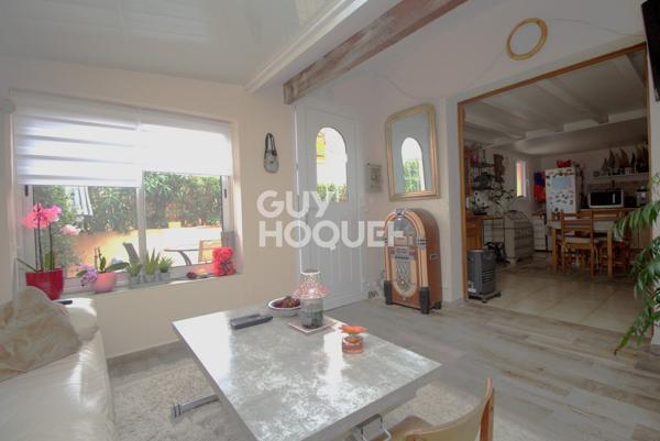 Maison T2 en copropriété + véranda + parking privatif à acquérir en su