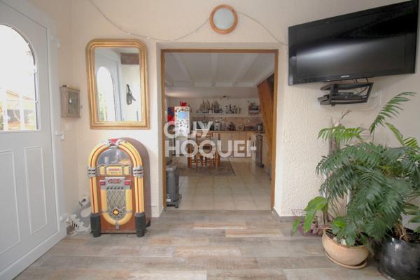 Maison T2 en copropriété + véranda + parking privatif à acquérir en su