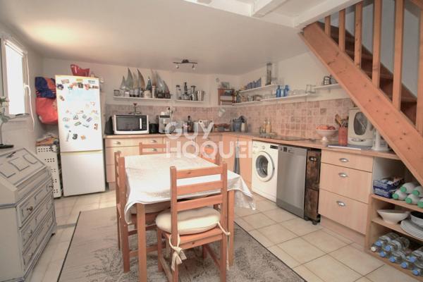 Maison T2 en copropriété + véranda + parking privatif à acquérir en su