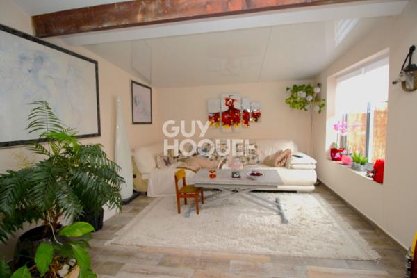 Maison T2 en copropriété + véranda + parking privatif à acquérir en su