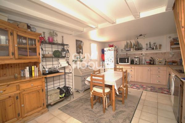 Maison T2 en copropriété + véranda + parking privatif à acquérir en su