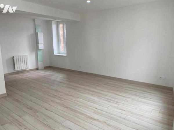 L AIGLE - immeuble commerce et appartement
