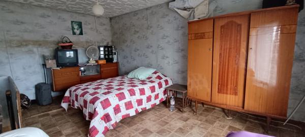 MAISON A RENOVER AVEC GARAGE ET BEAU TERRAIN