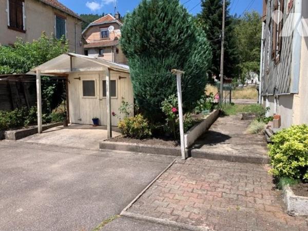 maison mitoyenne avec garage et terrain
